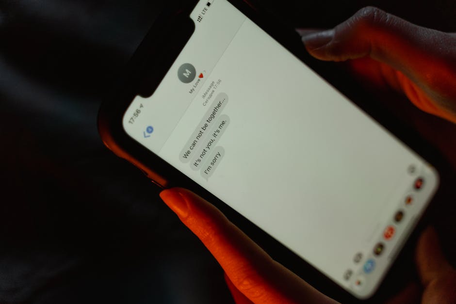 Illustration of USPS/UPS Delivery Text Scam (Smishing) — a text message on a smartphone